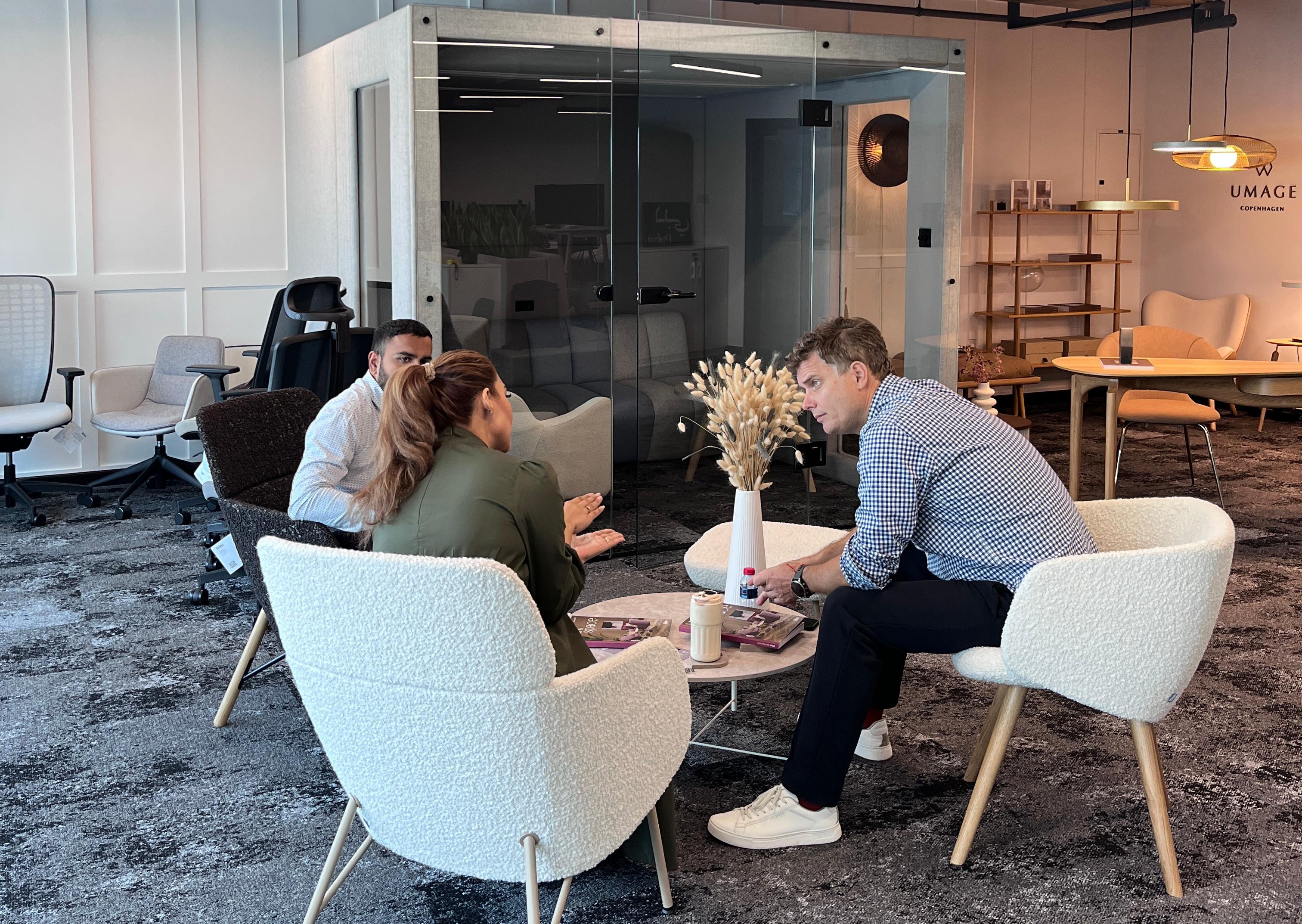 three people talking